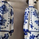 Pair of vintage Chinese blue and white porcelain figurines depicting