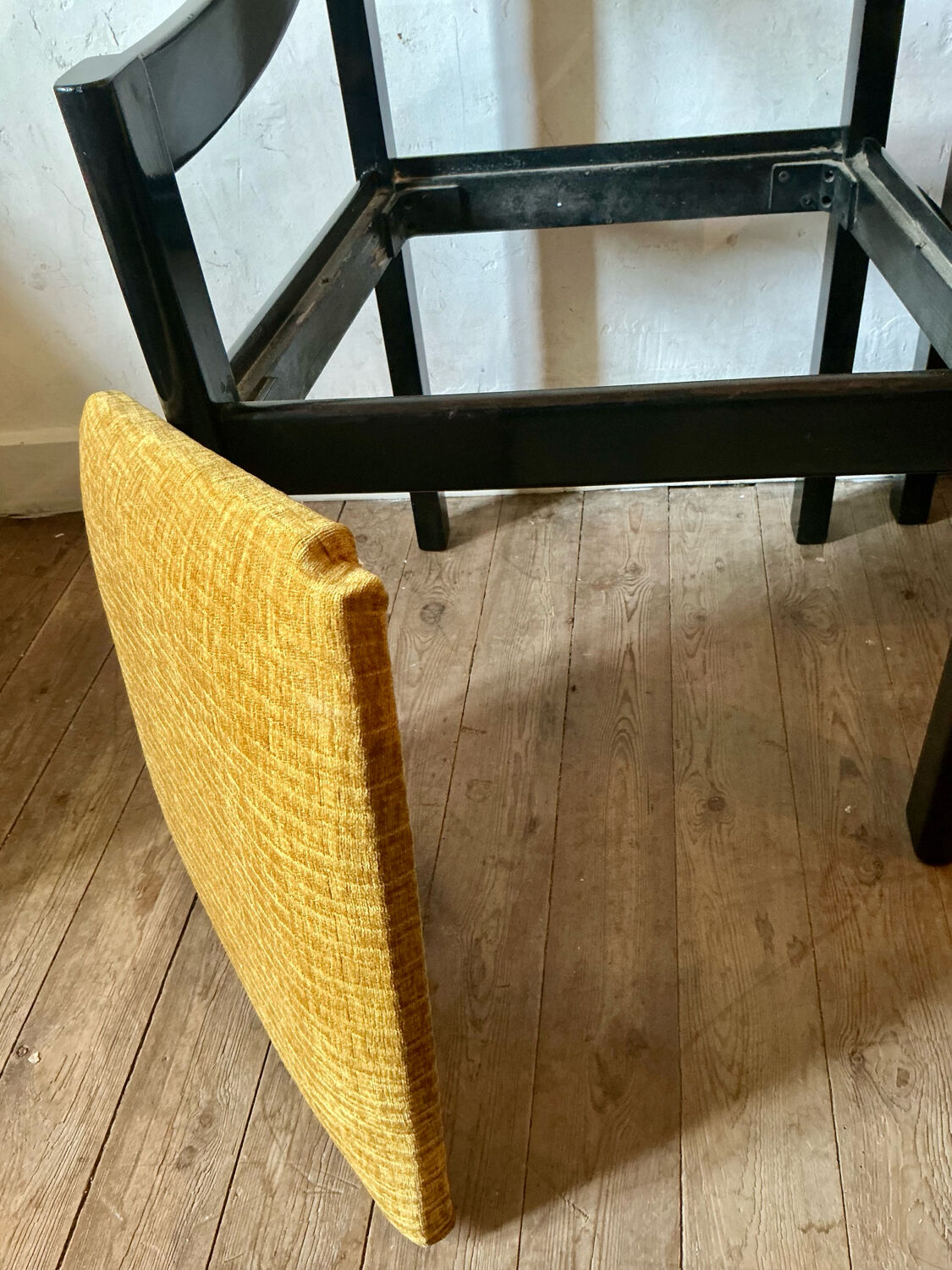 Four designer armchairs