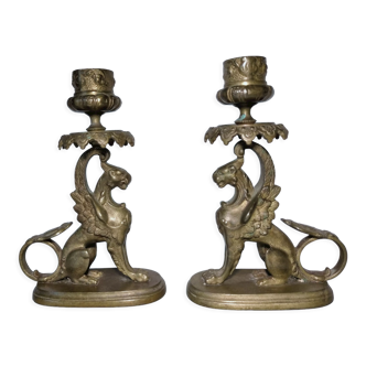 Pair of bronze hand candlesticks decorated with chimeras 19th century