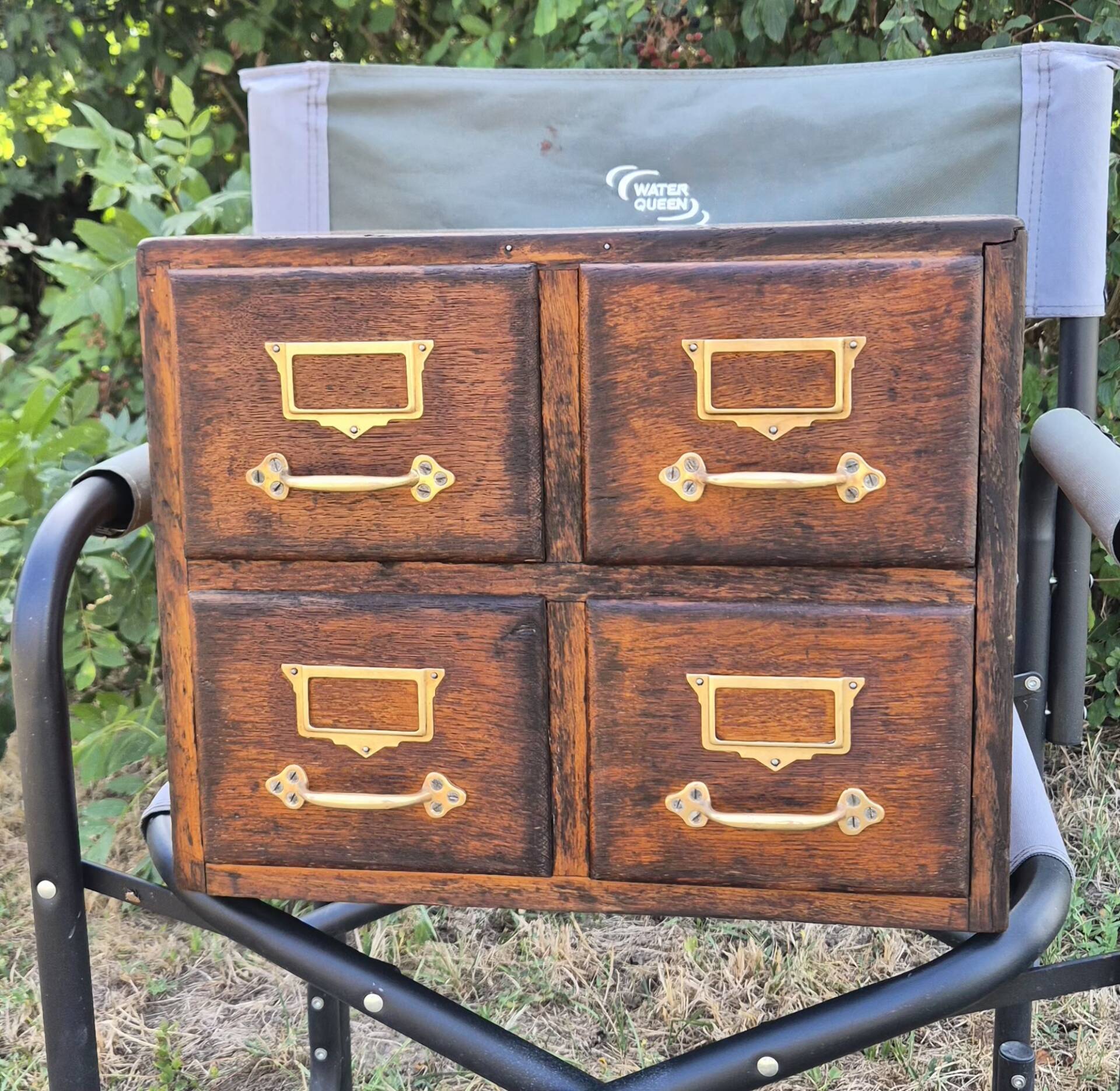 Workshop furniture made of oak and brass.