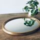 Miroir ovale doré 46x65cm