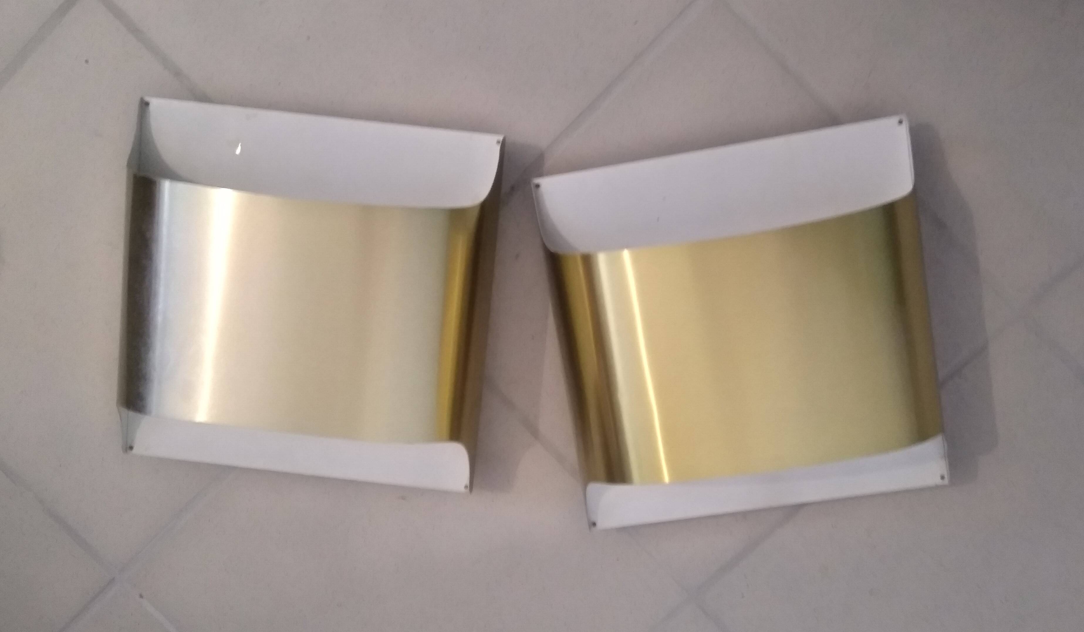 Pair of Staff 1970 wall lights in gold color