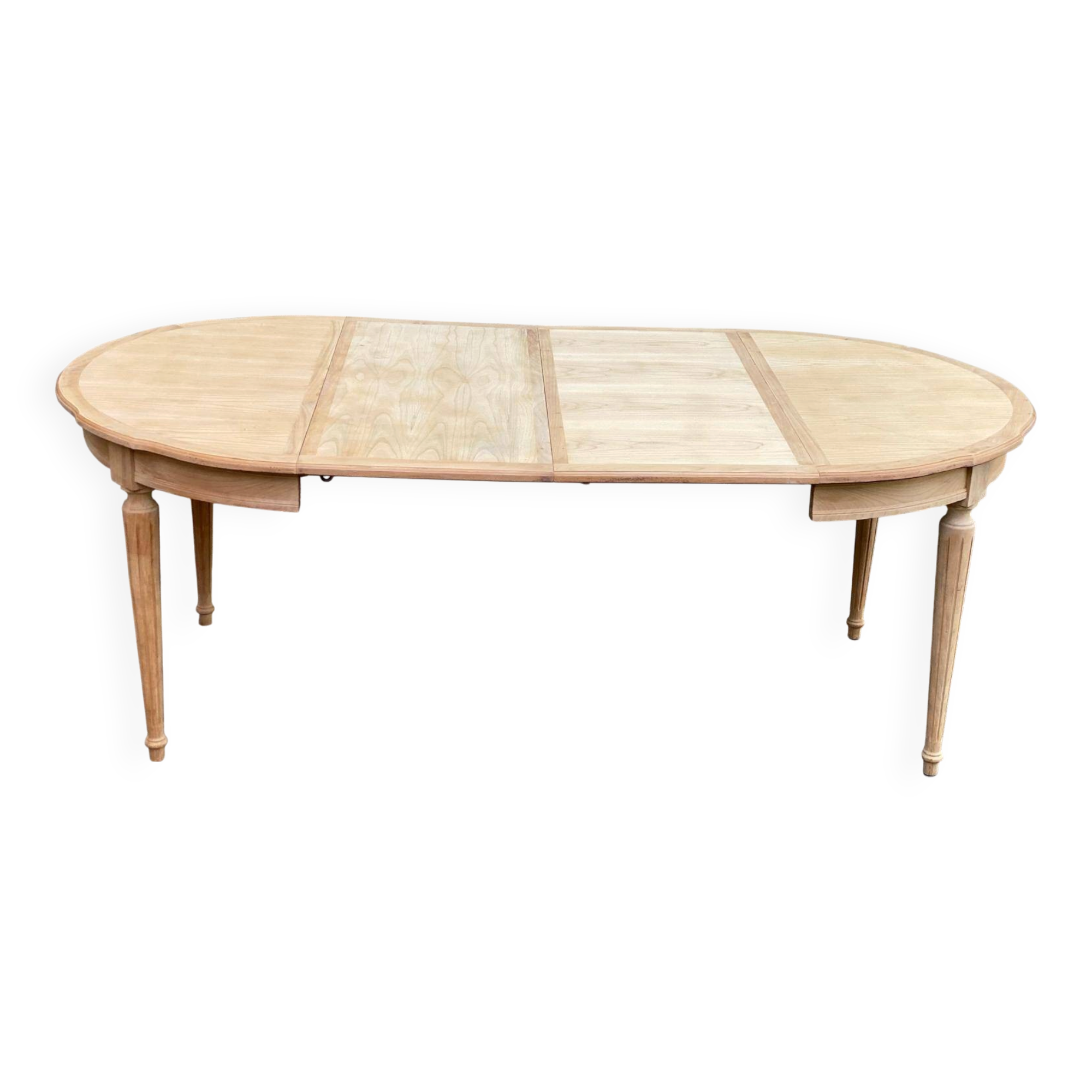 Extendable round table in renovated Louis XVI style, made of light wood, with 2 extensions.