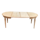 Extendable round table in renovated Louis XVI style, made of light wood, with 2 extensions.