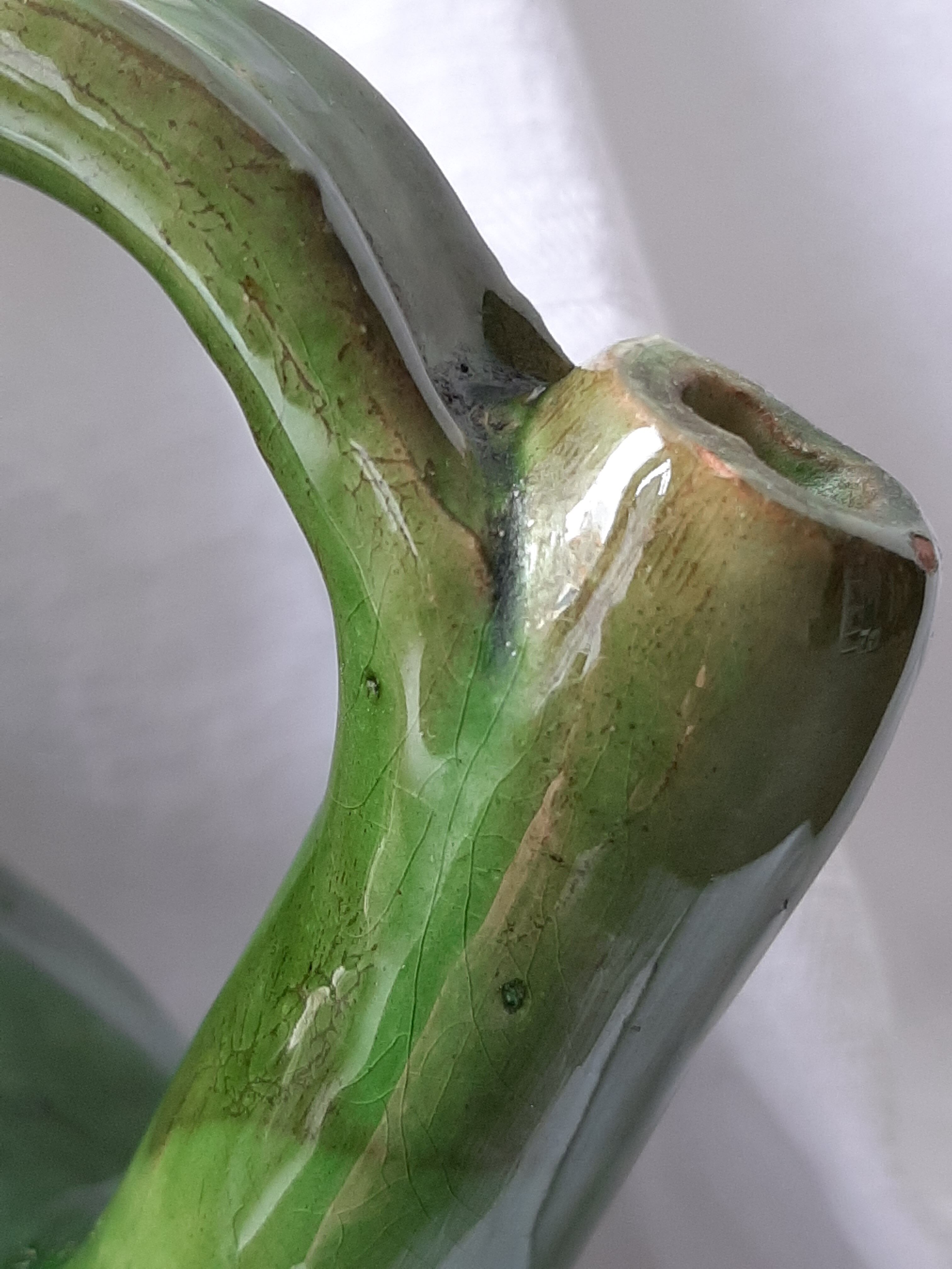 Old glazed terracotta pitcher