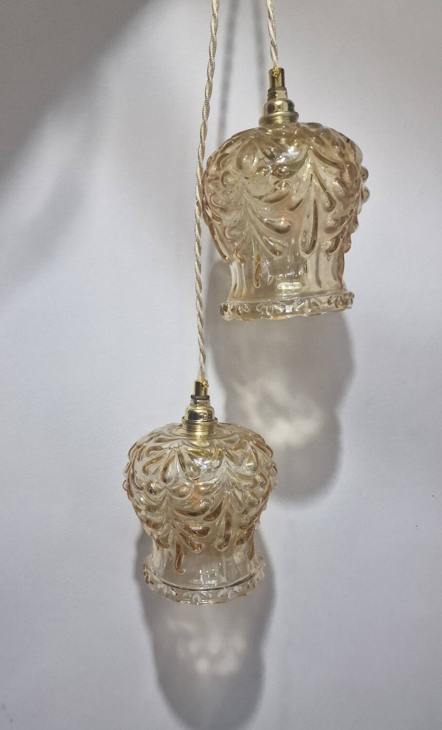 Duo of amber molded glass portable lamps