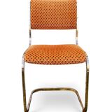 Set of 4 vintage sled chairs from the 1970s