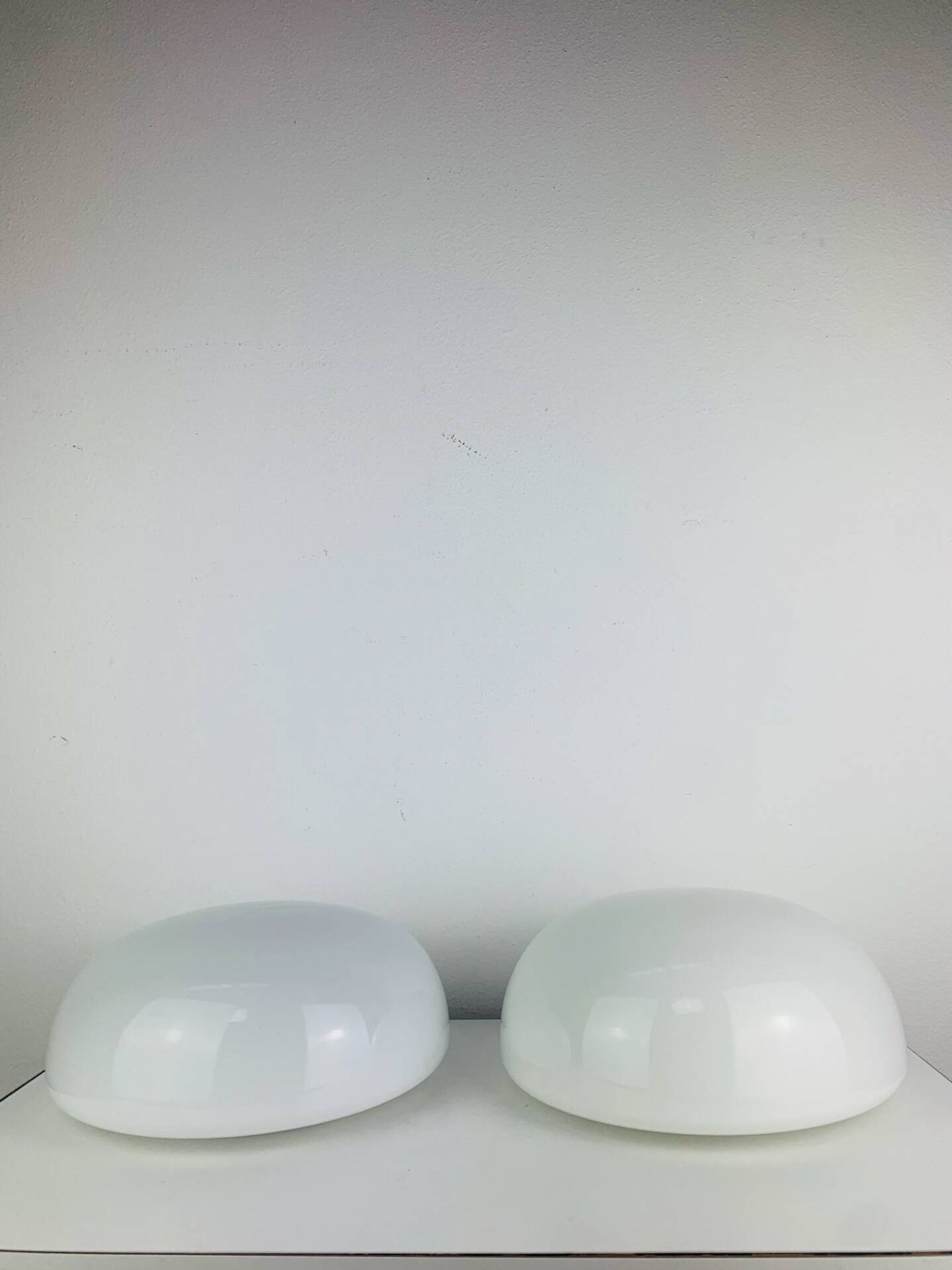 Pair of half-sphere wall lights in white opaline, Italy 1960