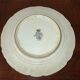 Faience plate in Longwy enamels signed Léa Valenti representing Fruits