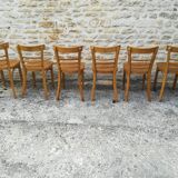 12 varnished bistro chairs