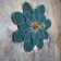Peacock blue rattan and linen 24 petal flower wall light