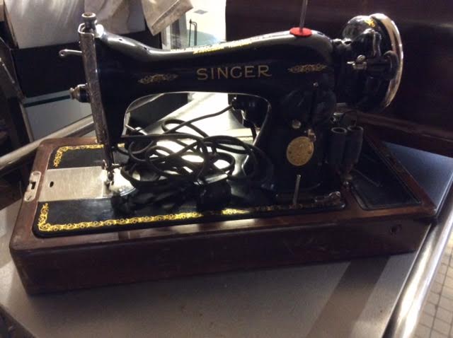 Machine à coudre singer portable