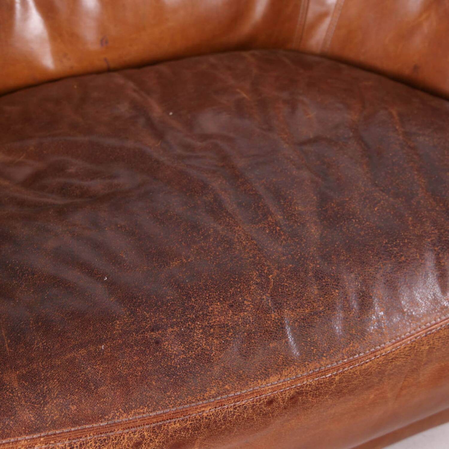 Grands fauteuil et ottoman en cuir