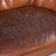Grands fauteuil et ottoman en cuir