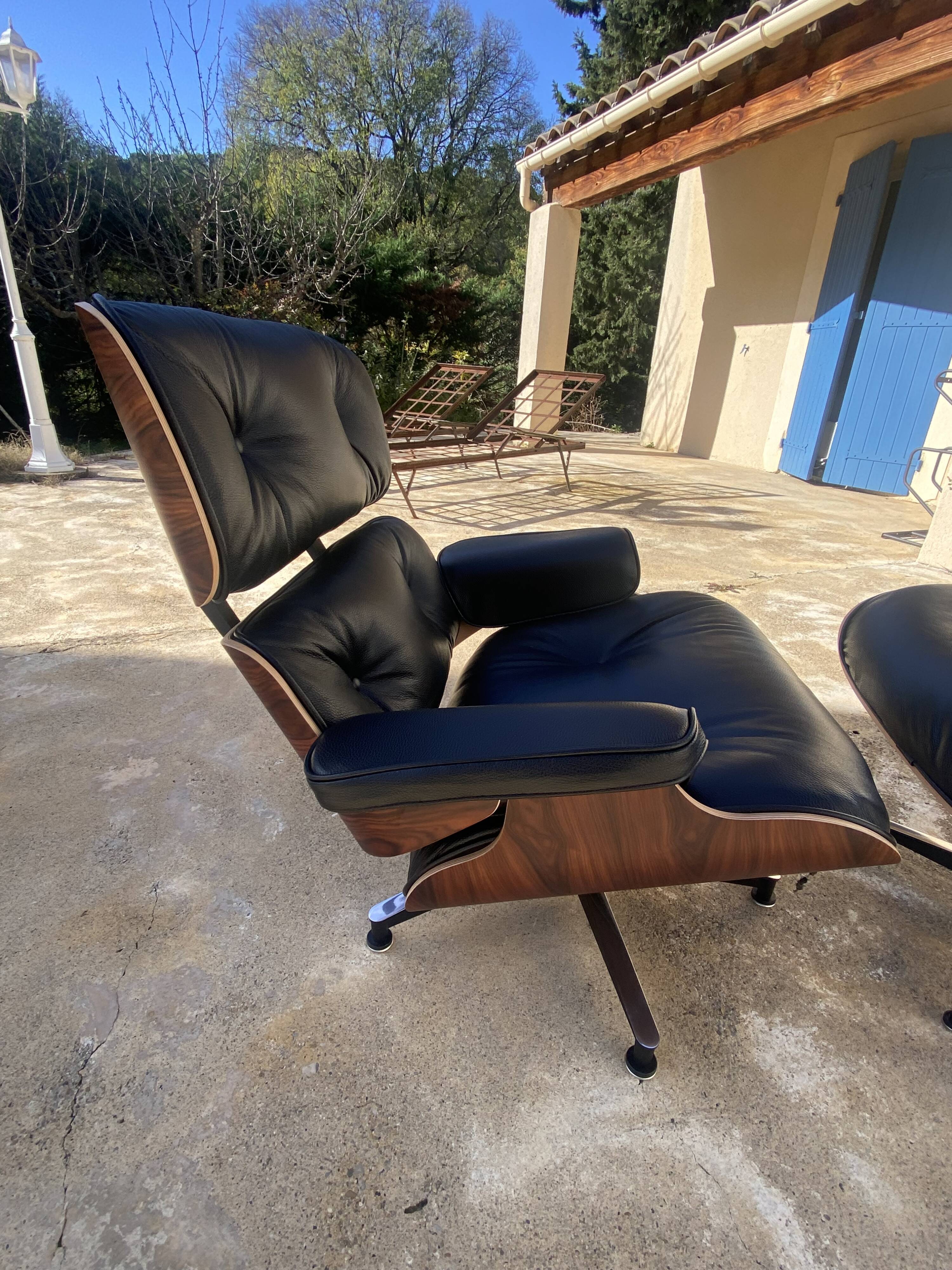 Fauteuil et Ottoman Charles Eames noir, Herman Miller, 2010