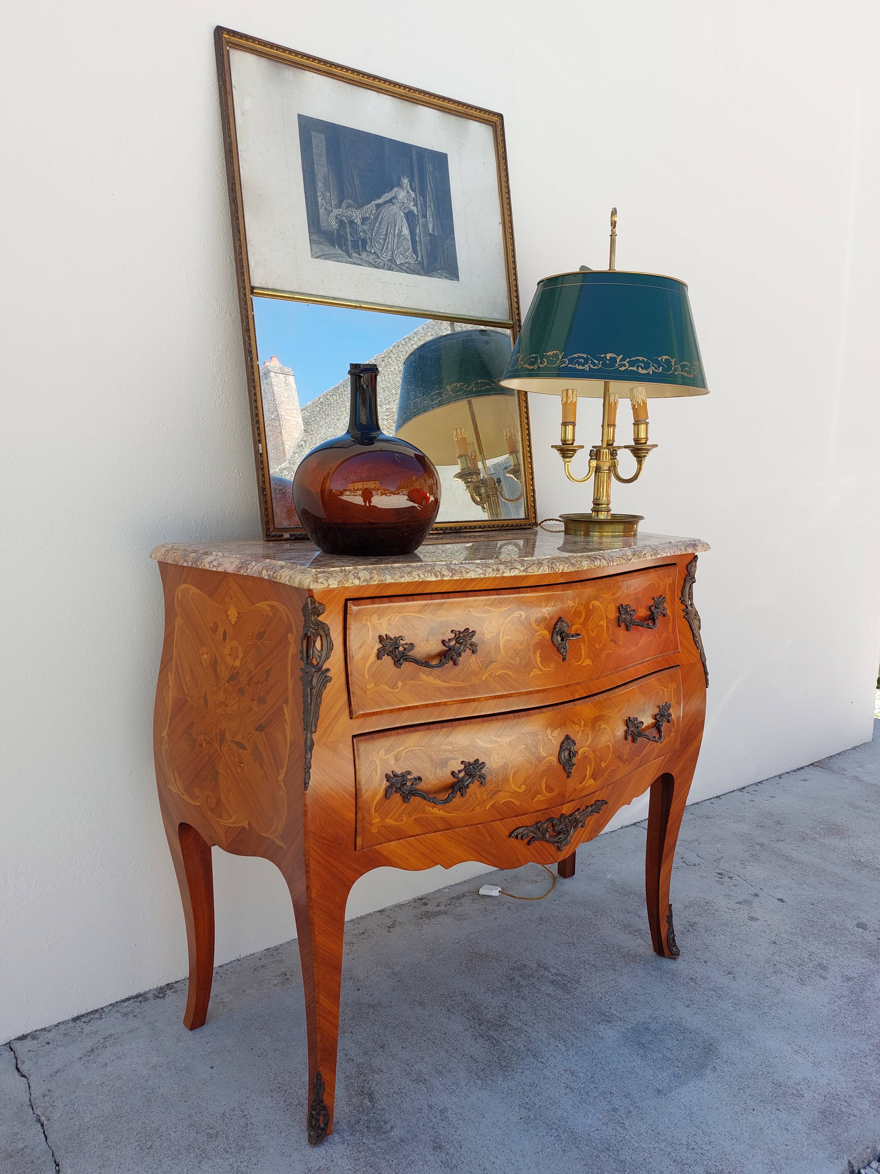 Louis XV chest of drawers in rosewood marquetry