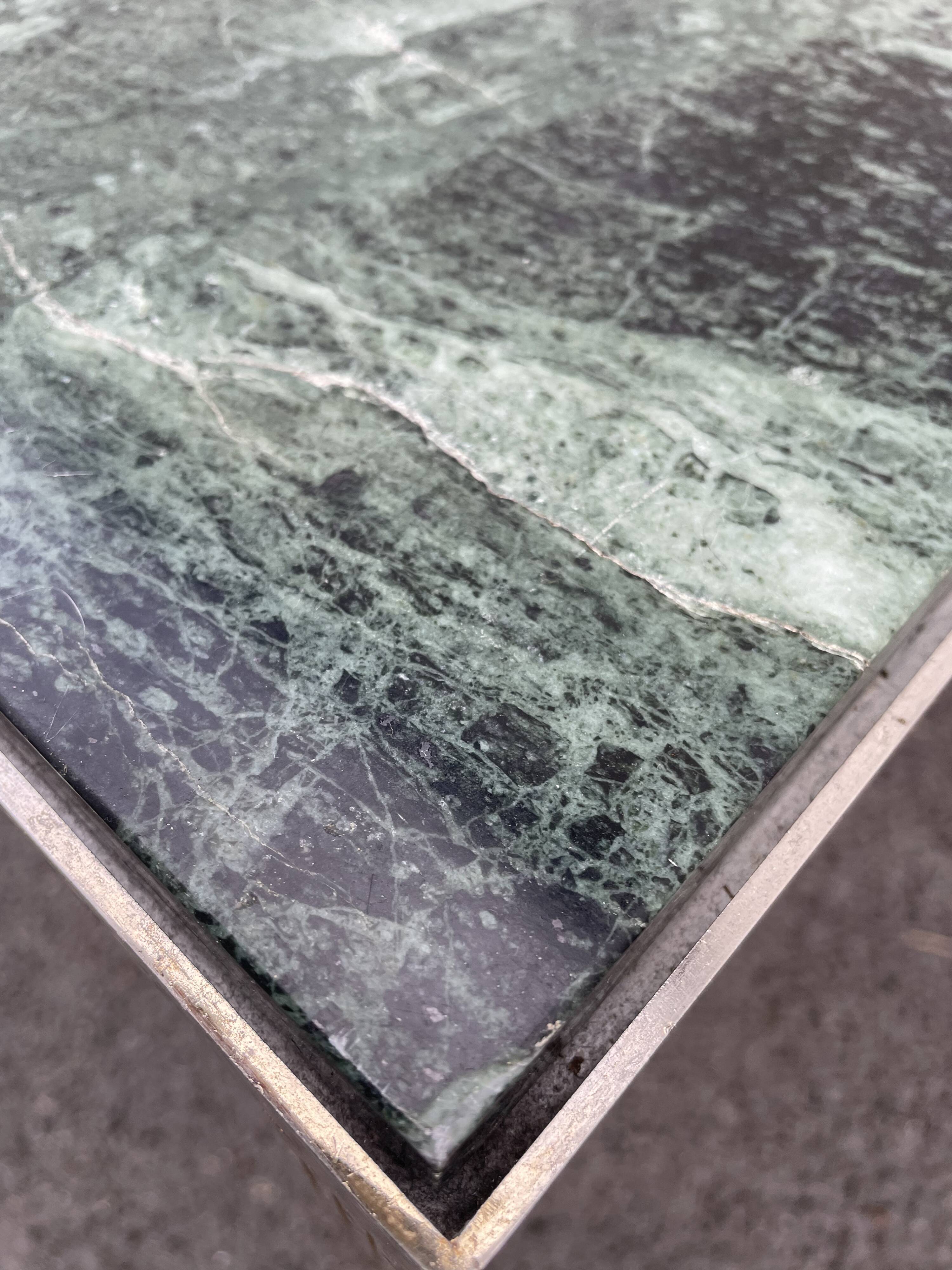 Coffee table in gilded brass and veined green marble