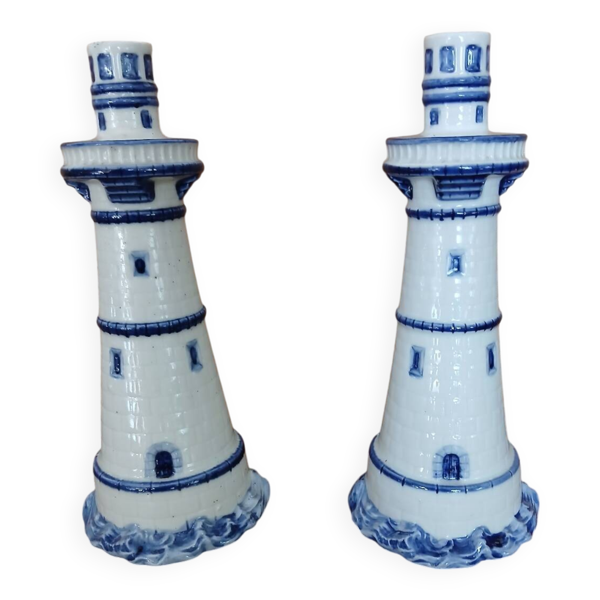 Pair of lighthouse-shaped candle holders