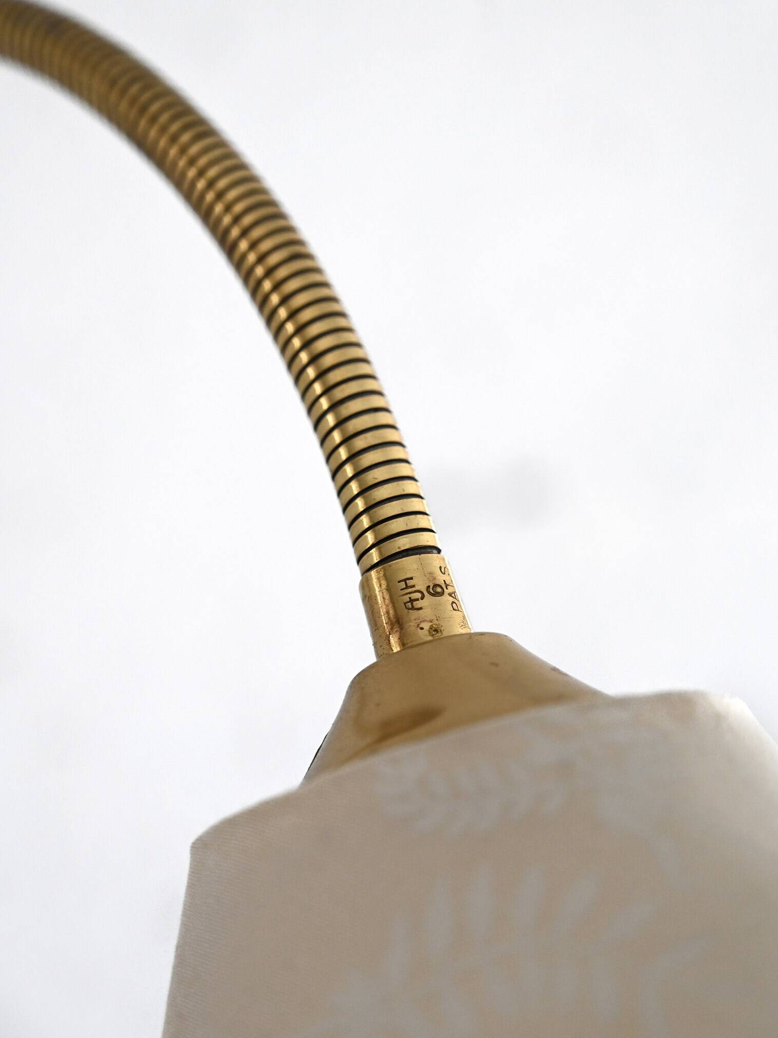 Vintage wall light in gold metal and cotton