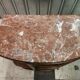 Old bedside table in wood and marble