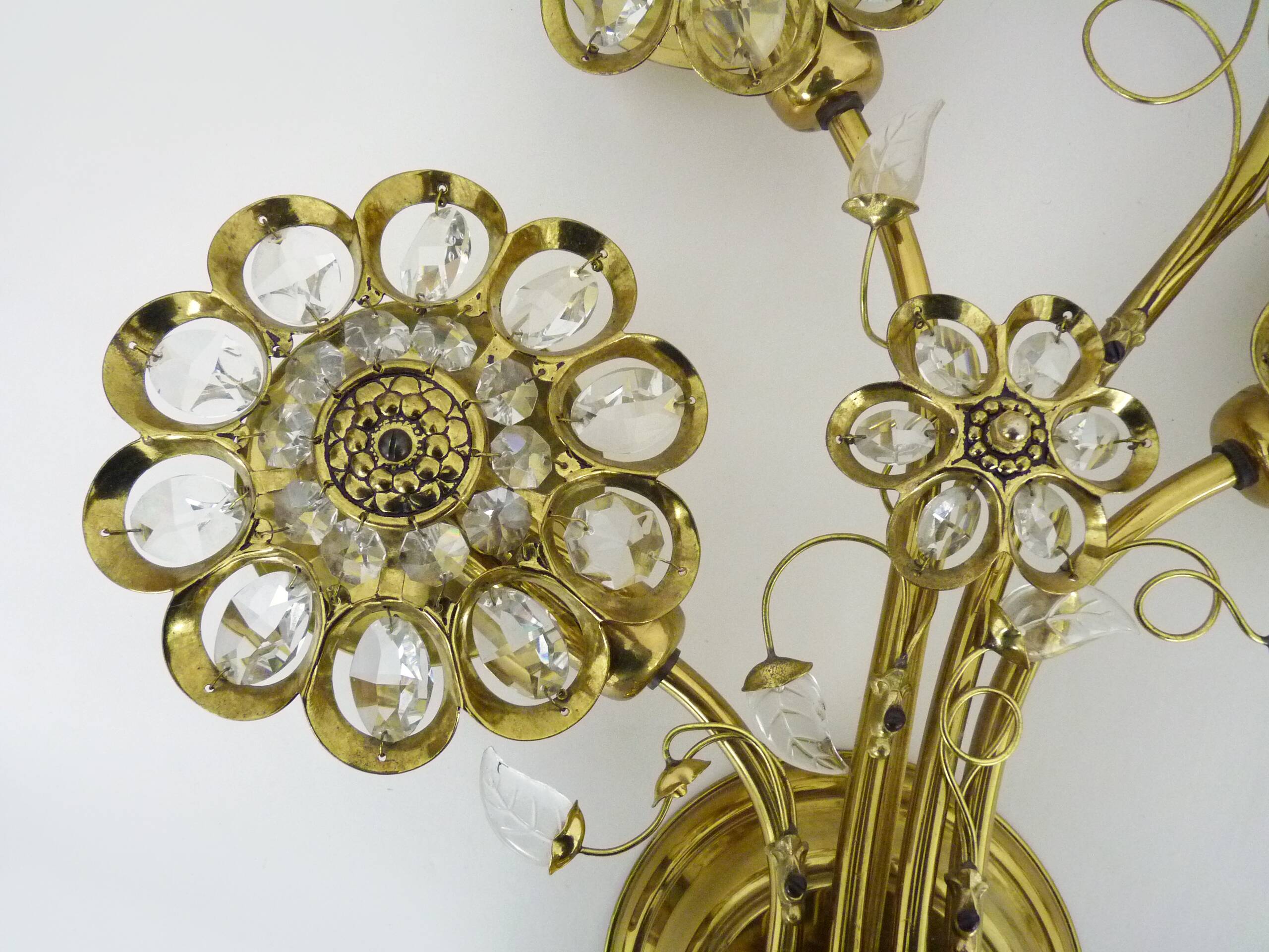 Large pair of vintage Palwa crystal and brass flower wall lights with 4 lights. 70s
