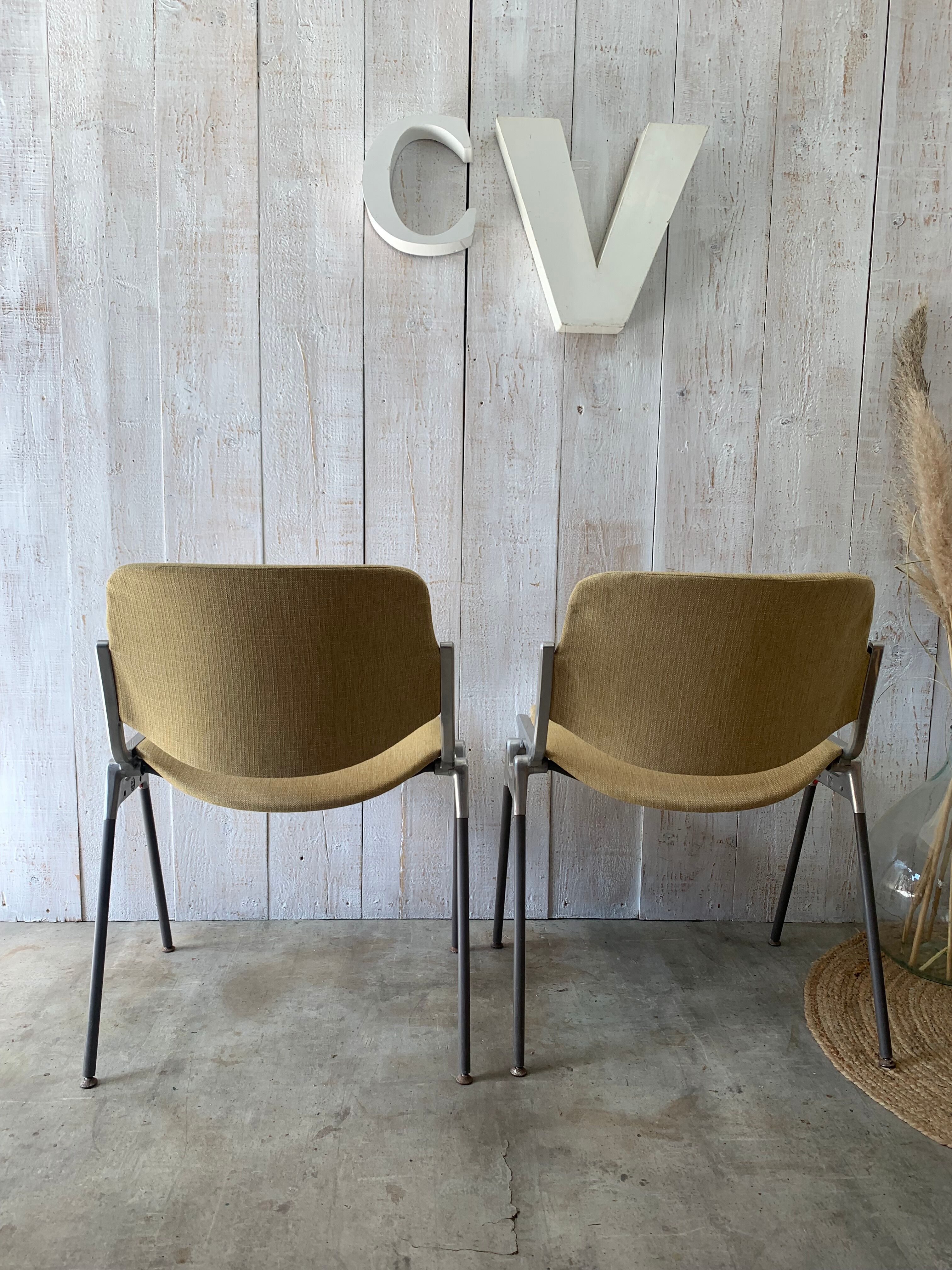 Pair of yellow Castelli chairs
