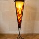 Important Art Nouveau street lamp in wrought iron and glass paste.