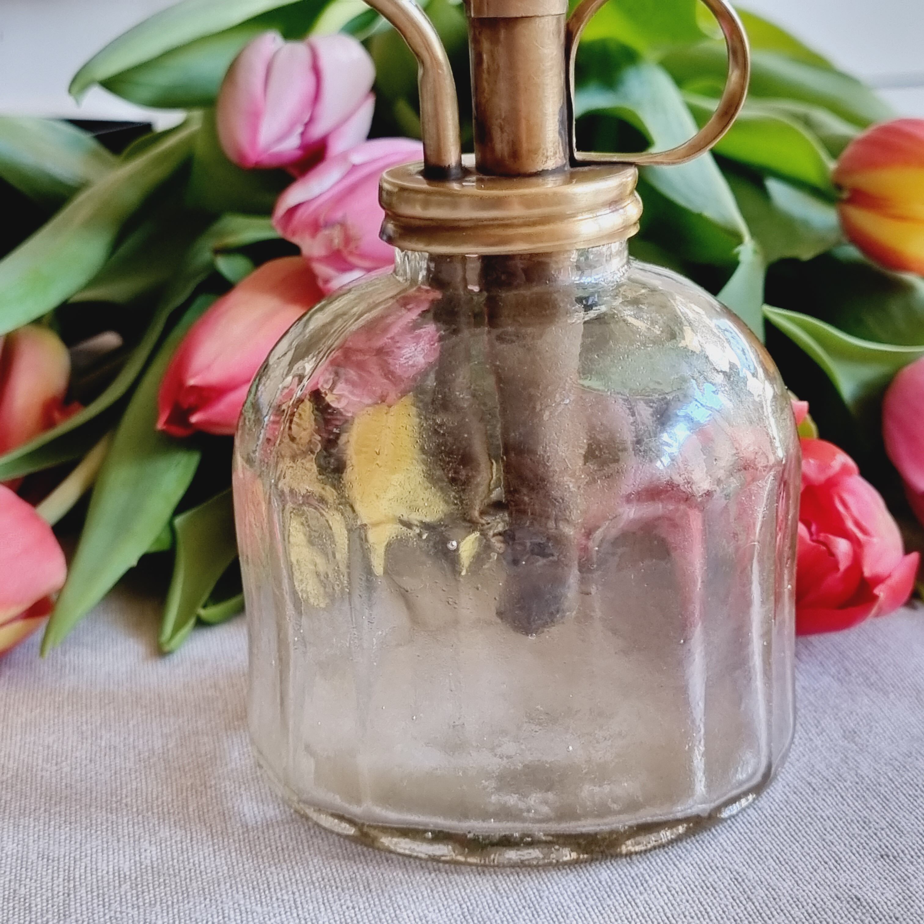 Brass and transparent glass sprayer