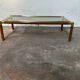Gold metal coffee table with elm burl imitation.