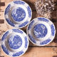 Trio of hollow porcelain plates