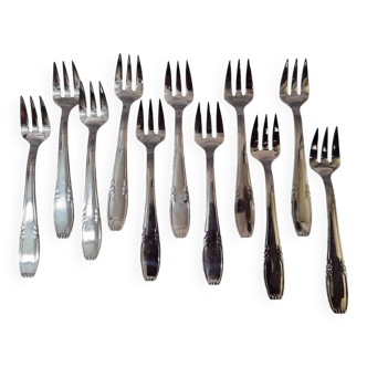 11 oyster forks from 1980