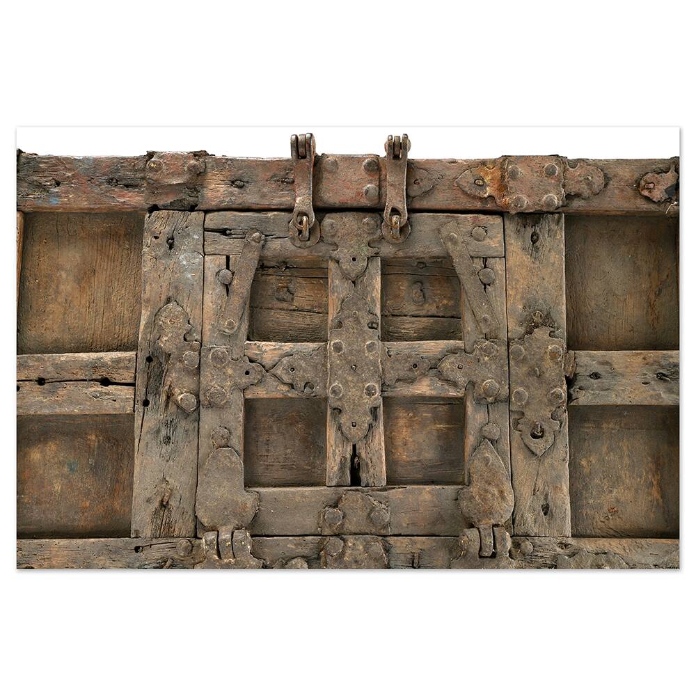 Large wooden and metal chest with red patina