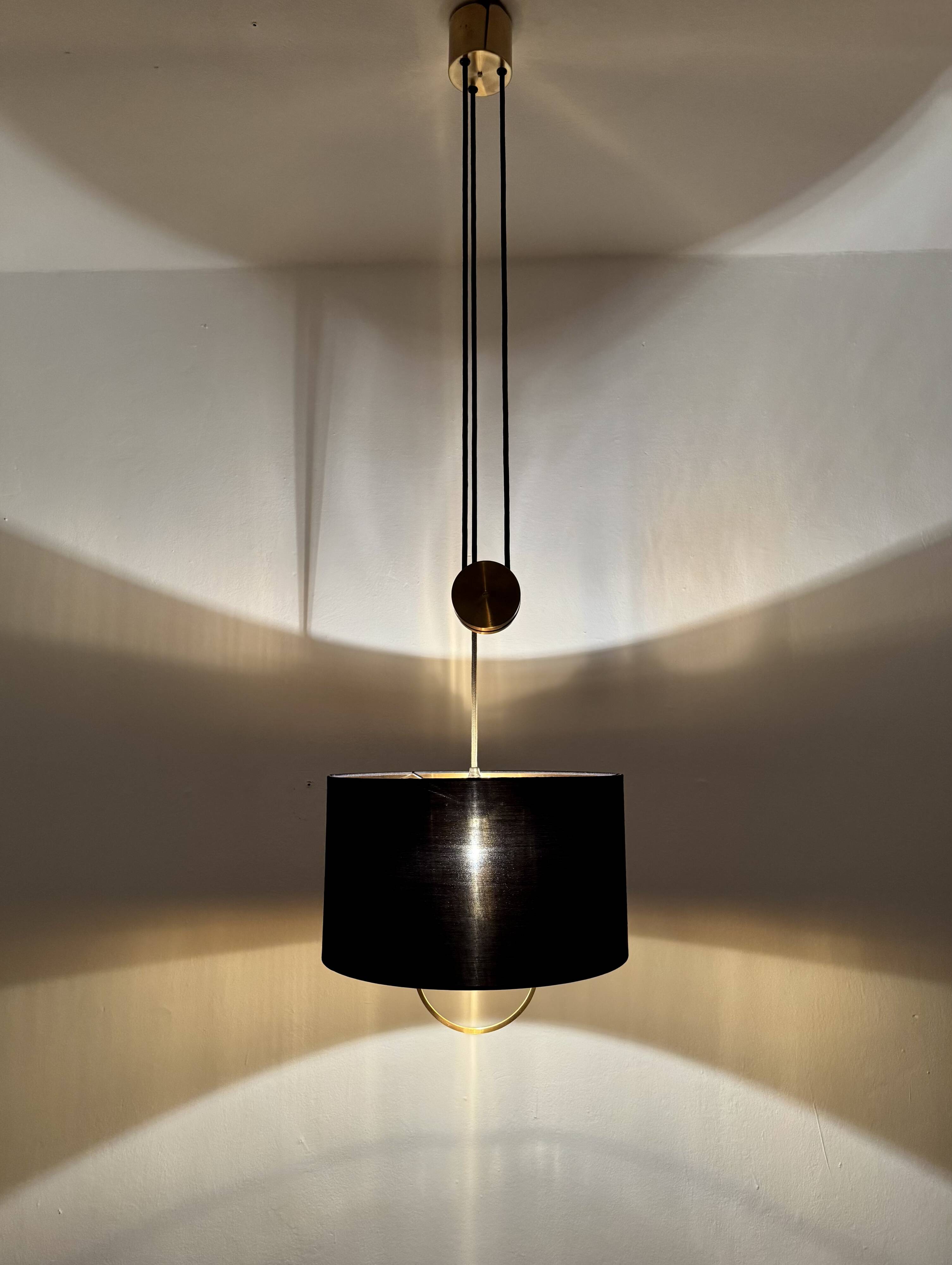Lampe à pendentif Jo-Jo réglable par Florian Schulz