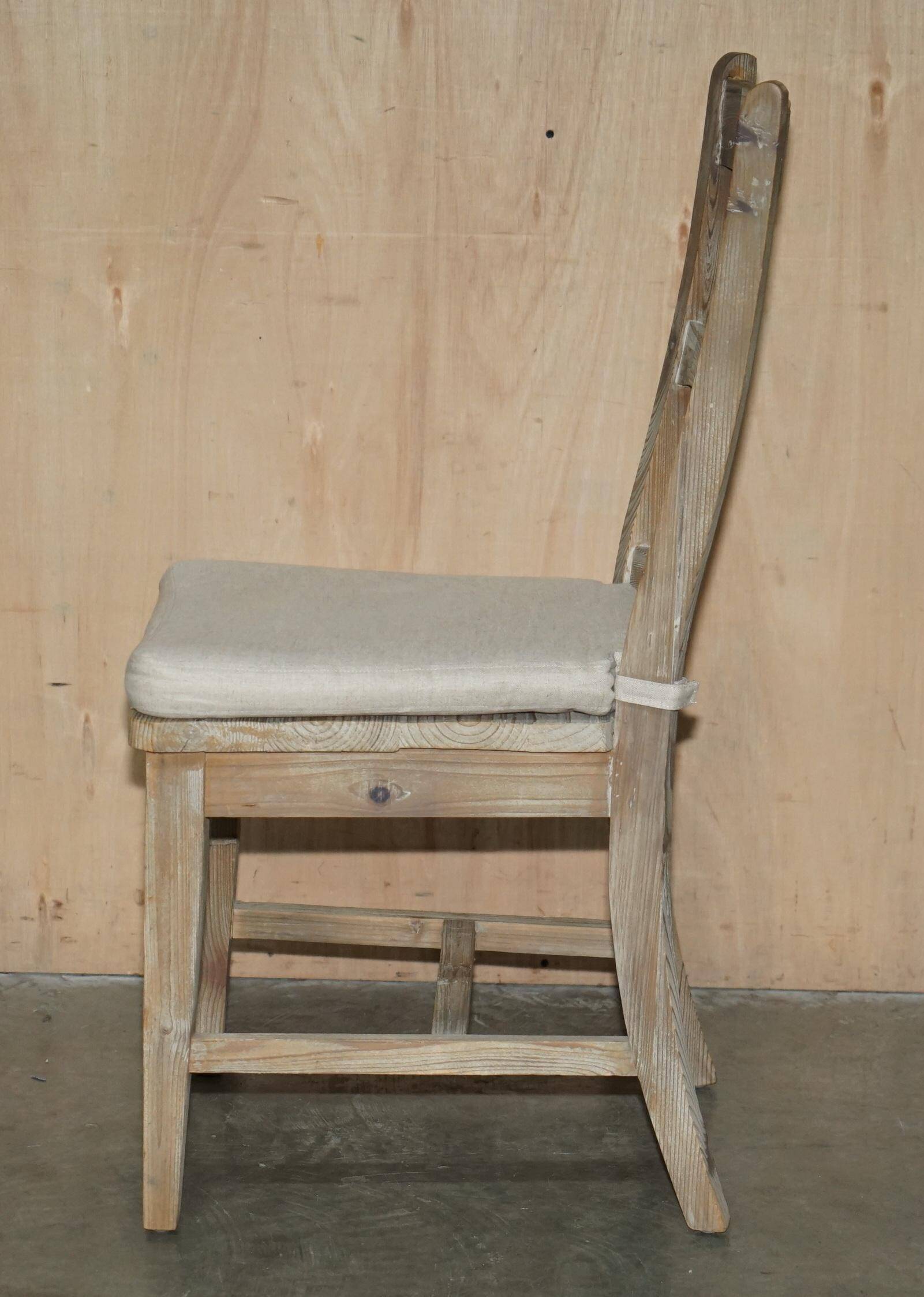 Pair of Swedish-style accent chairs in recycled pine with upholstered seats.
