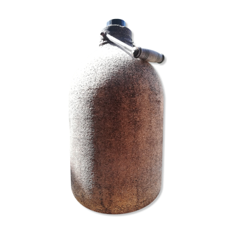 Old bottle covered with liege