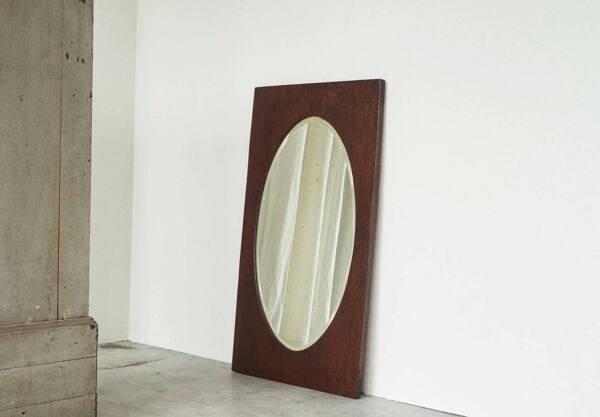 Miroir ovale facetté cadre rectangulaire chêne années 1920