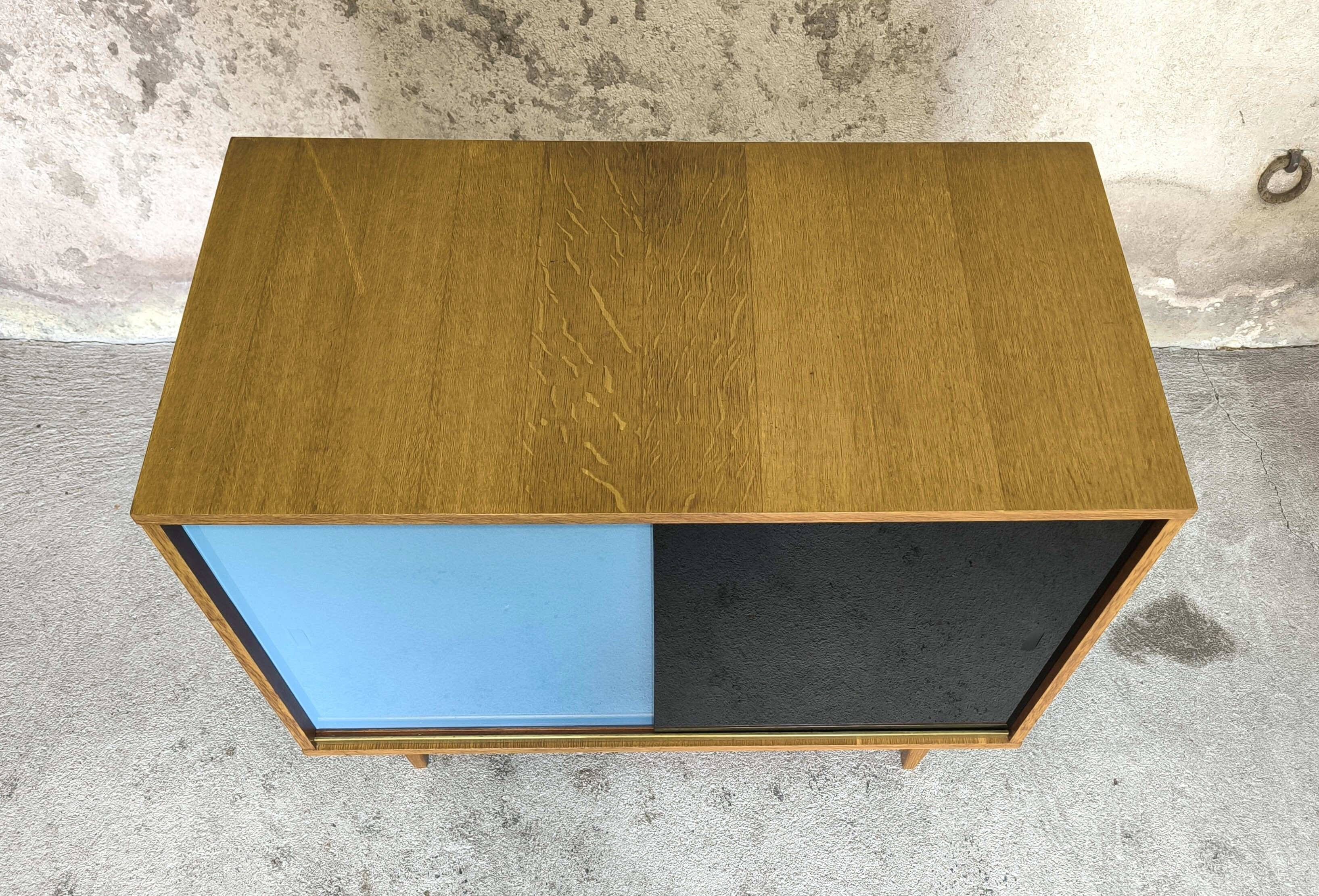 Vintage storage unit with sliding colored windows | Selency