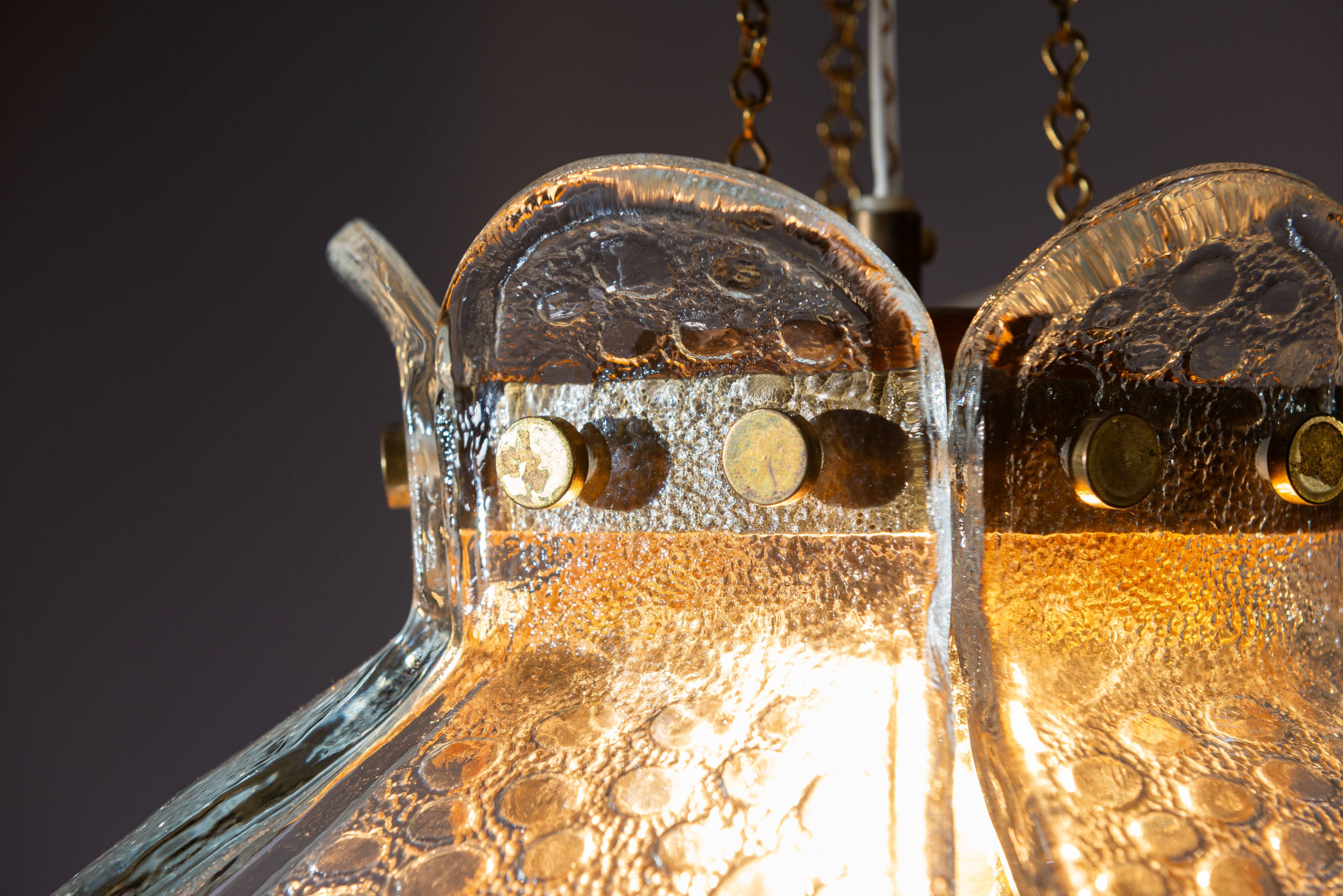 Swedish pendant with glass leaf shades and a center shade of amber coloured