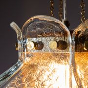 Swedish pendant with glass leaf shades and a center shade of amber coloured