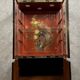 20th century China: Pretty bookcase in lacquer, hard stone and mother-of-pearl with three glazed sides