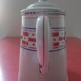 White enamelled sheet metal coffee maker with red and blue patterns