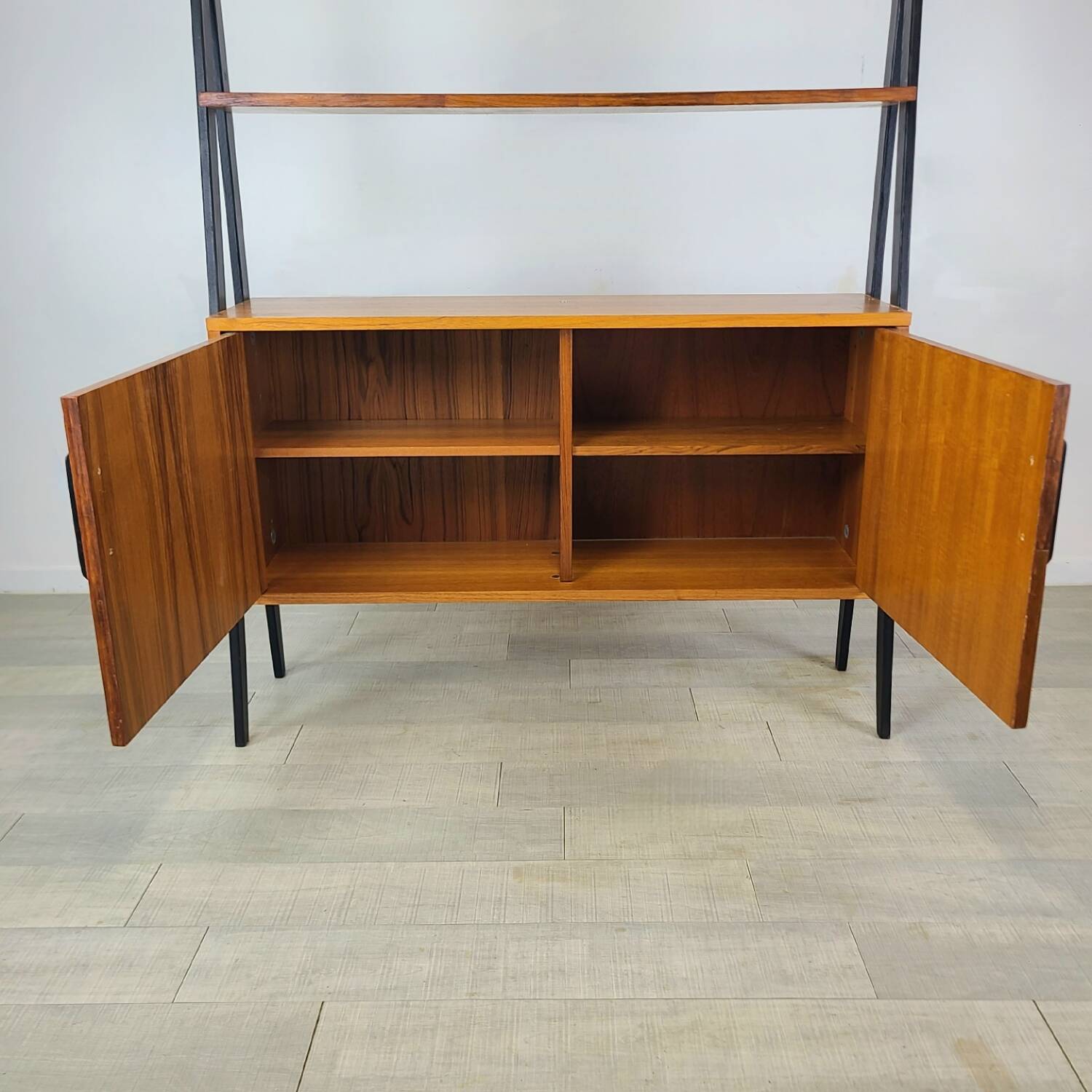 Vintage 1960s Scandinavian teak bookcase with compass legs