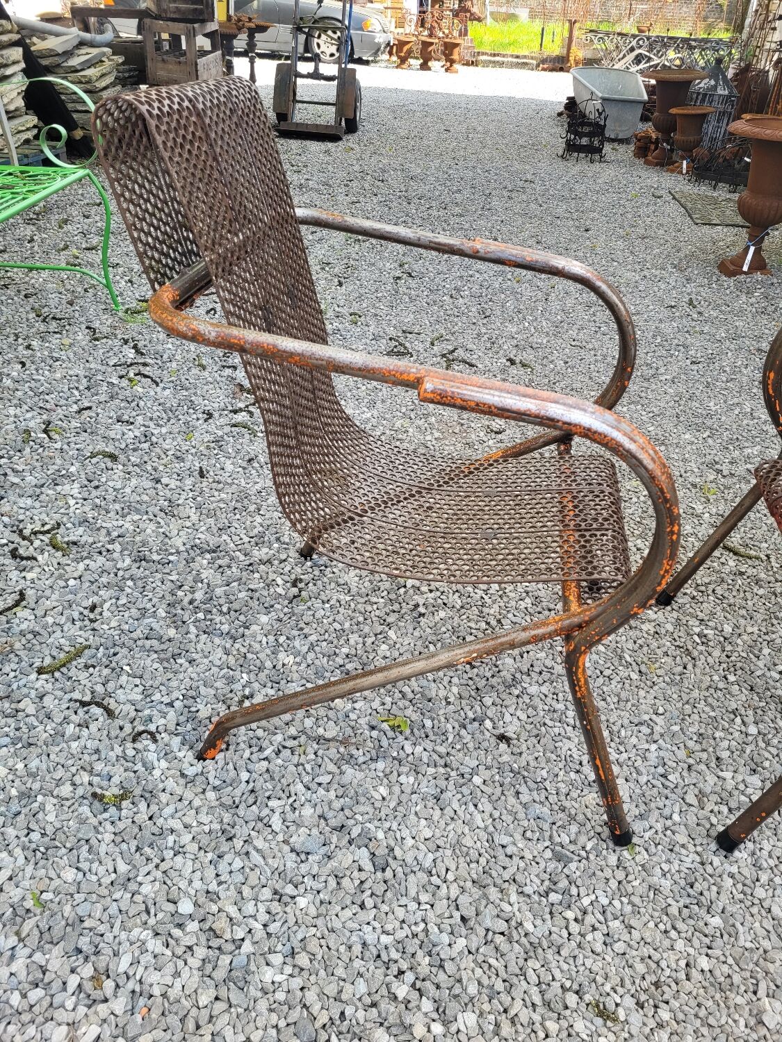 Paire de fauteuils en métal perforé de René Malaval 1950