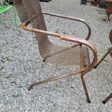 Pair of perforated metal armchairs by René Malaval 1950
