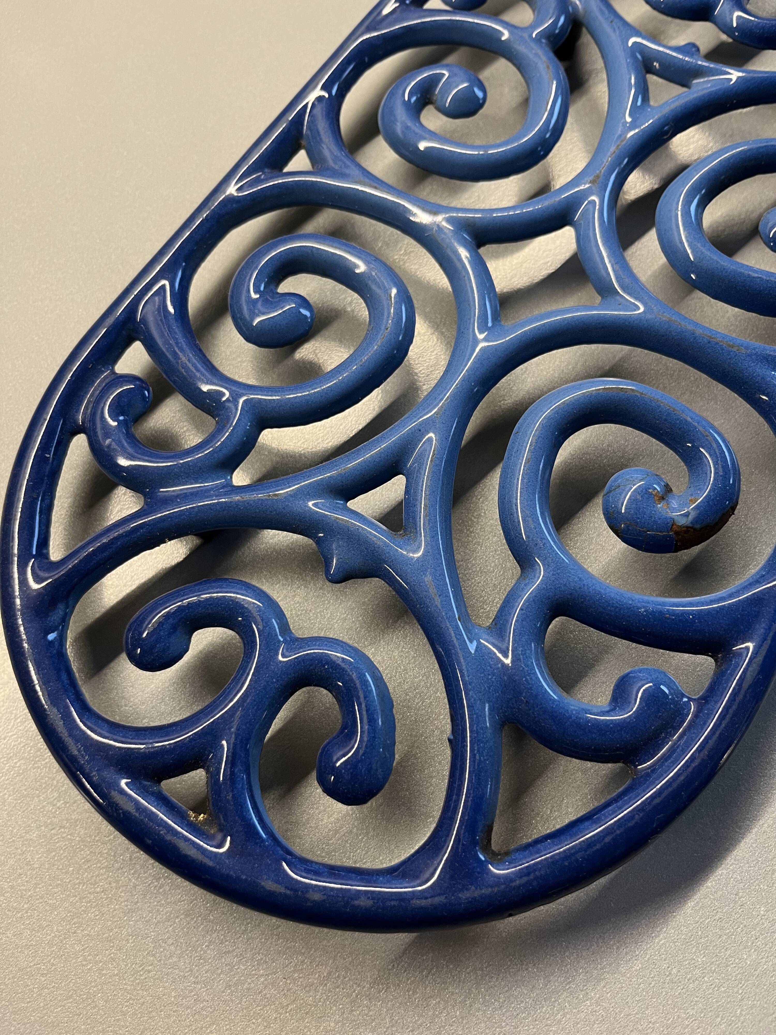 Old cast iron table mat