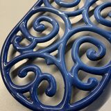 Old cast iron table mat