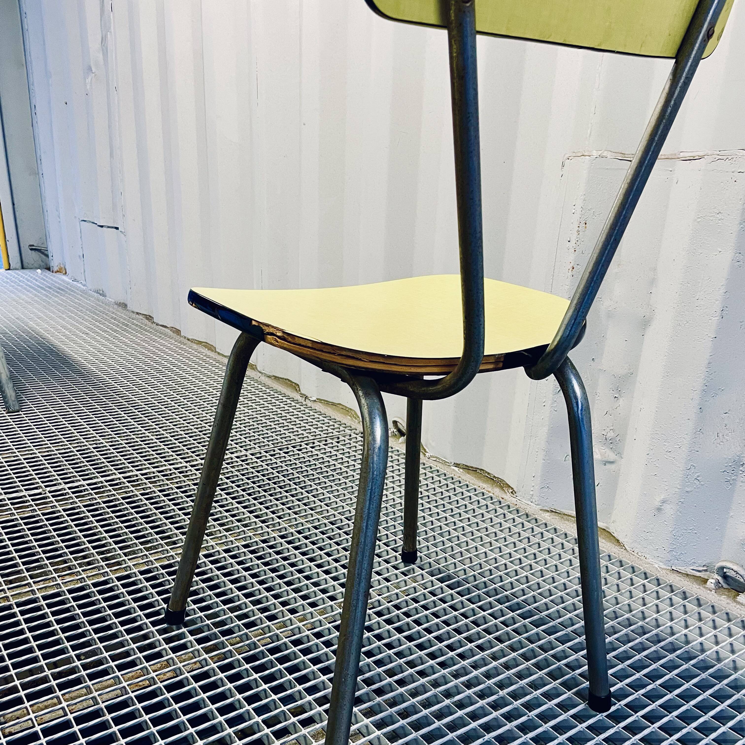 Red Formica table and vintage yellow chairs