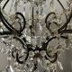 Antique cage chandelier with rock crystal pendants
