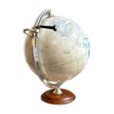 Tecnodidattica illuminated world map with magnifying glass