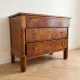 Antique wooden storage cabinet with display case.
